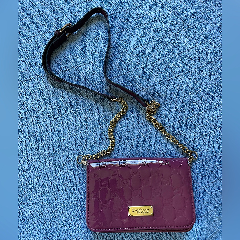 Bebe convertible clutch/shoulder bag/crossbody in mauve/berry/wine